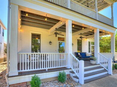 Doorway to property with a porch and ceiling fan