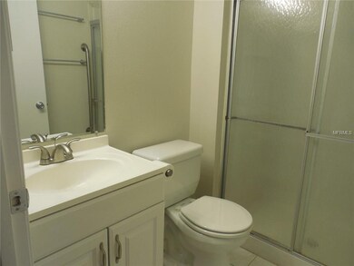 Master bathroom with updated vanity and glass door on shower