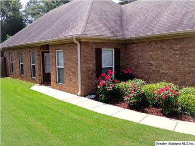 beautifully landscaped side private entrance into 