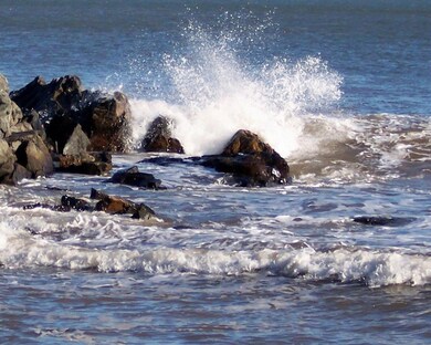 Crashing surf plus a gravel/sandy...