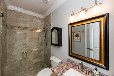 Main Floor Guest Bathroom Ensuite, with walking sh