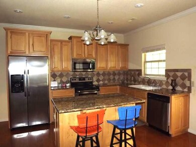 Kitchen. Island With Storage Doubles As A Snack Bar