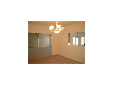 Dining Area. Large formal dining room has pass thr