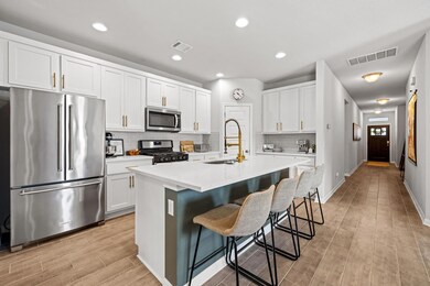 Kitchen with appliances with stainless steel fini