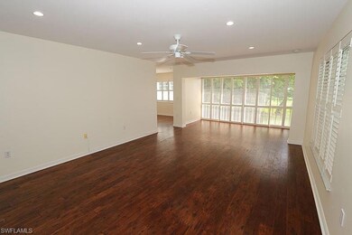Unfurnished room featuring dark wood-type flooring
