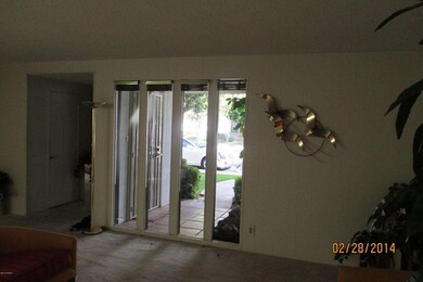 Living room looking out front windows