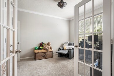 Dedicated home office with ample natural light and