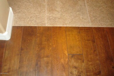Wood Flooring flows perfectly to tile fl