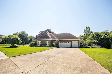 View of front of house featuring a front lawn and 