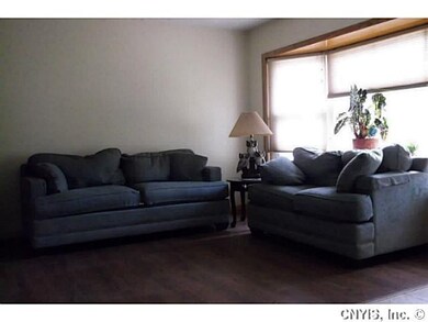 Living Room Light and bright living room with bow 