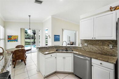 Kitchen featuring hanging light fixtures, sink, st