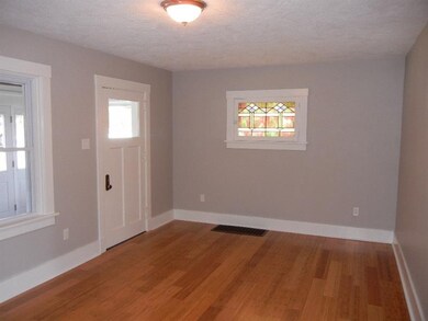 Entry to living room, after going through enclosed