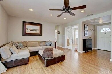 Family room with the double glass doors to the off