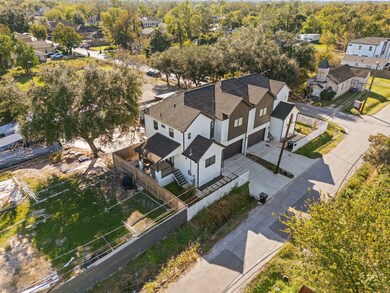 This stunning, modern duplex, built in 2023, offer