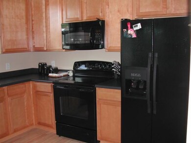 Kitchen. NEW COOKTOP ELEC STOVE, DISHWASHER, MICROWAVE, GARBAGE DISPOSAL STAY