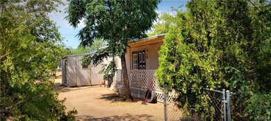 Large mature shade trees throughout the property