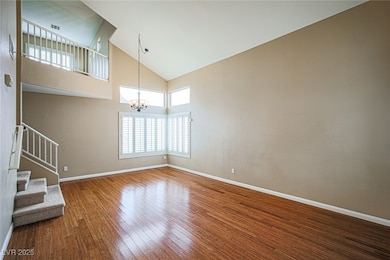 Unfurnished living room with wood finished floors,