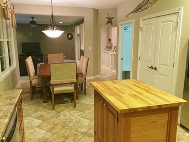Dining Room. BEAUTIFUL TILE FLOORS & LARGE PANTRY  FOR ADDED STORAGE