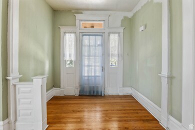 Entryway featuring hardwood / wood-style floors