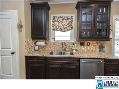 This beautiful Kitchen features an eat in area ope