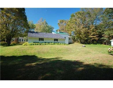 Exterior Back. Well-Lanscaped Lawn...