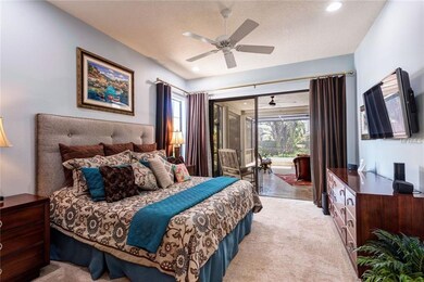Master bedroom leads to the beautiful travertine p