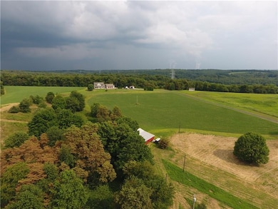 Front and lower field woods and barn. Home in dist