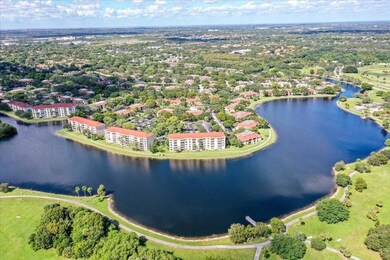 AERIAL VIEW BUILDING AND LAKE