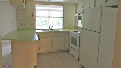 View from Foyer straight ahead into kitchen.