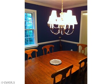 Dining Room - formal with crown moulding and chair