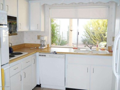 kitchen with sun patio view