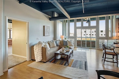 Open Floor Plan with Living Room, Kitchen, Den/Din