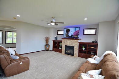 Another angle of the main floor family room towards the front office/living room area which can be set up for either one.