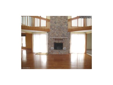 Large, 2 story great room with stone fireplace and