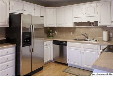 Updated spotless kitchen with stainless appliances