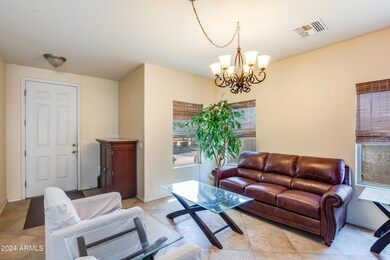 Front entry spills into formal living rm