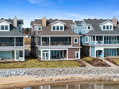 860 Pointe Dr unit 64, Boyne City, MI 49712 - photo 2