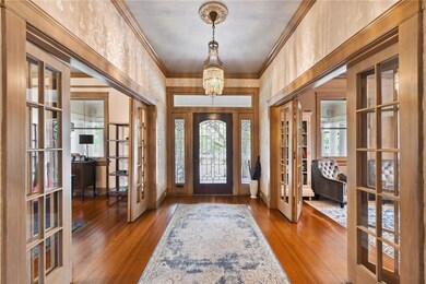 Stunning view of the foyer, complete with ornate l