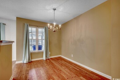 Unfurnished dining area with baseboards, a texture