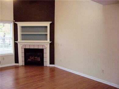 Living Room. Living room has gas fireplace and ope
