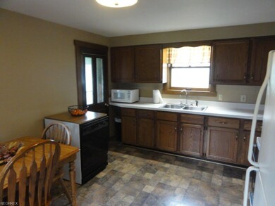 Eat-in kitchen is larger than this picture shows. 