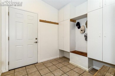 Tiled Mud Room coming in from the garage side.