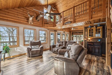 Open concept living room with Lakeview windows