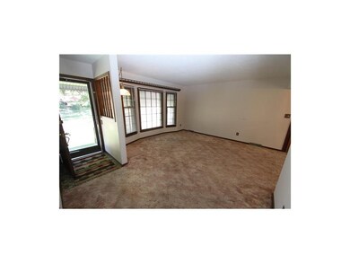 The Living Room is nice and bright...measures 17'x