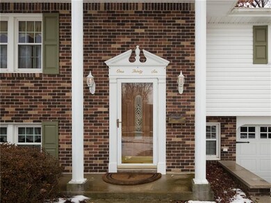 Striking newly updated front entry door.