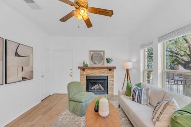 Living room featuring wood finished floors, a fir