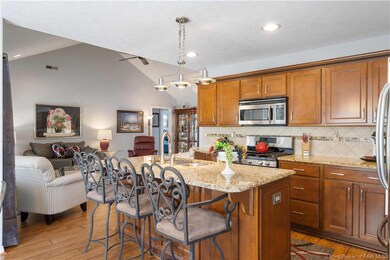 Kitchen opens to living space