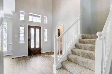 Recently installed laminate flooring throughout th