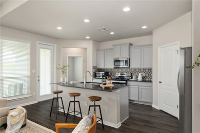 Adjacent to the dining room, the spacious and open