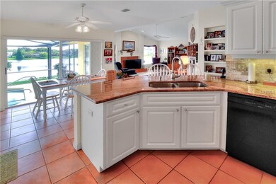 Kitchen overlooks nook and lanai